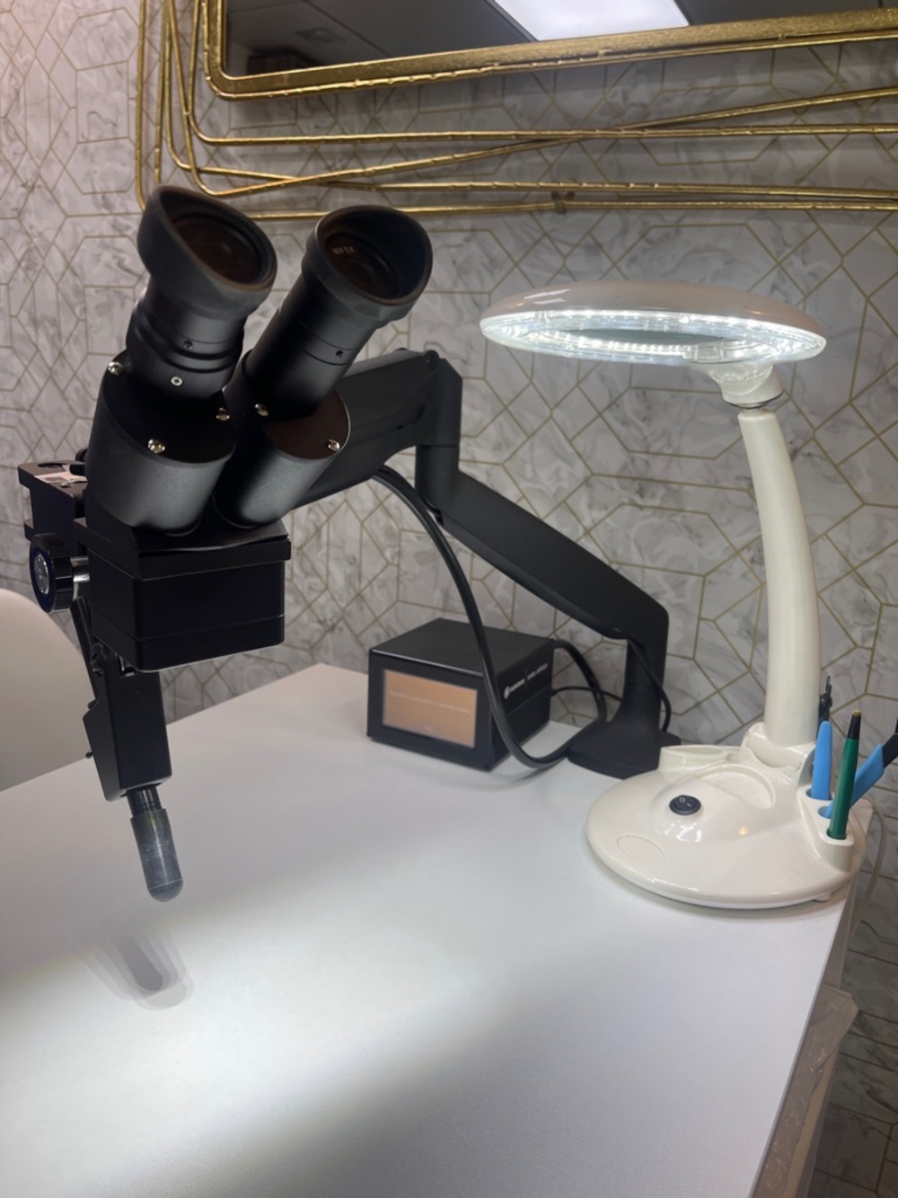 Welder Mounted above Microscope on Articulation Arm